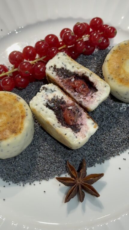 Syrnyky with poppy seeds and cherries